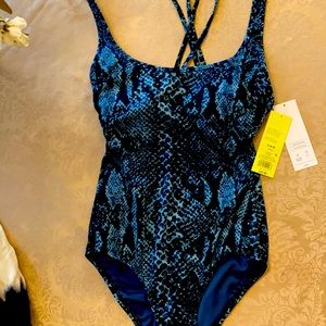 Slimming one piece swim suit.